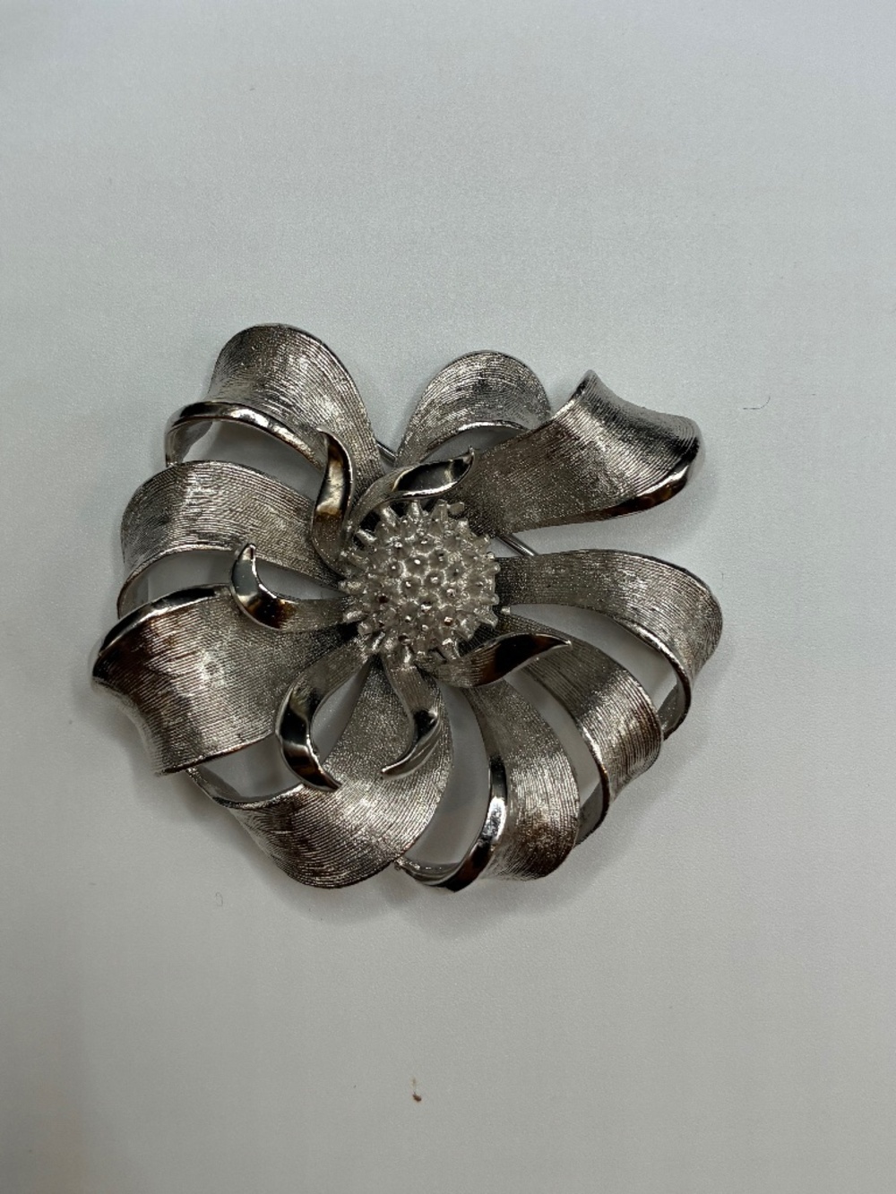 Vintage Coro signed Silver tone swirled flowered textured brooch pin